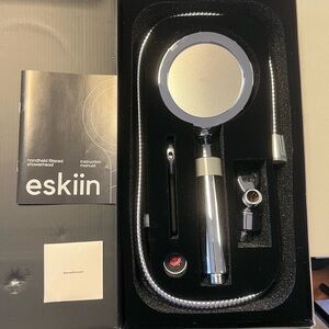 NIB eskiin filtered handheld shower head with filter included